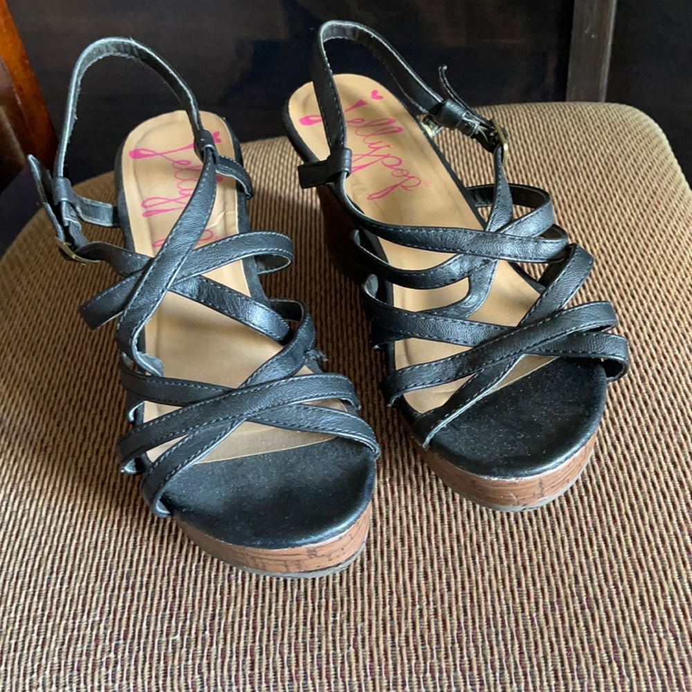 Strapped black heels.